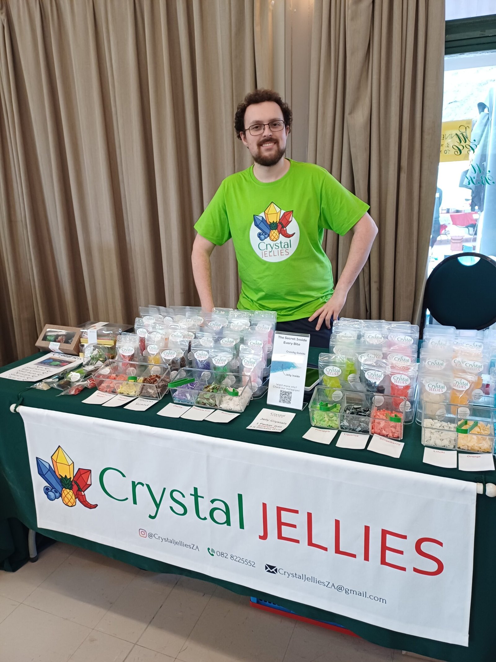 David standing behind the crystal jellies market stand